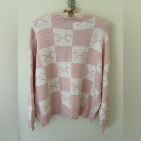 Sincerely Jules Baby Pink and White Knit Bow Cardigan
Size: Small
NWT - Picture 11 of 15